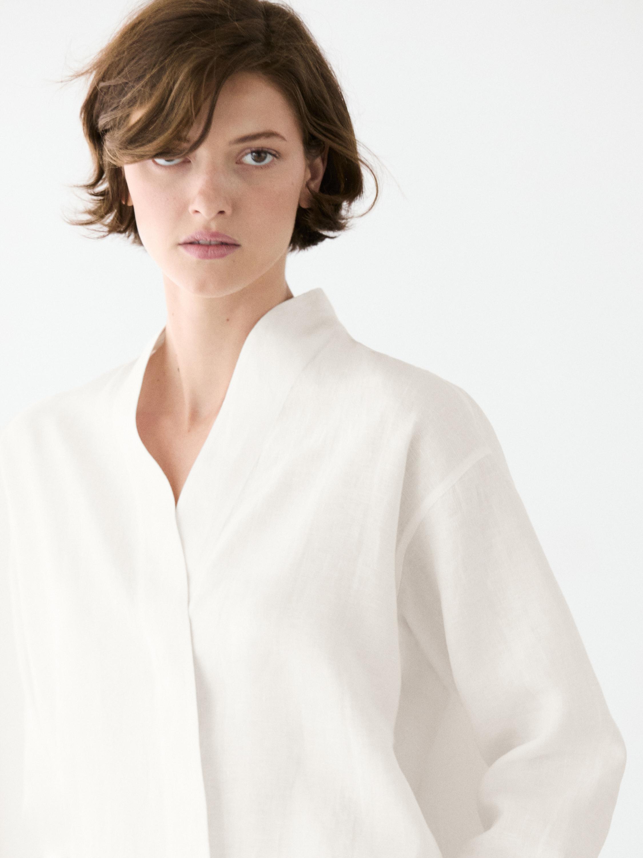 Flowing linen blouse with surplice neckline